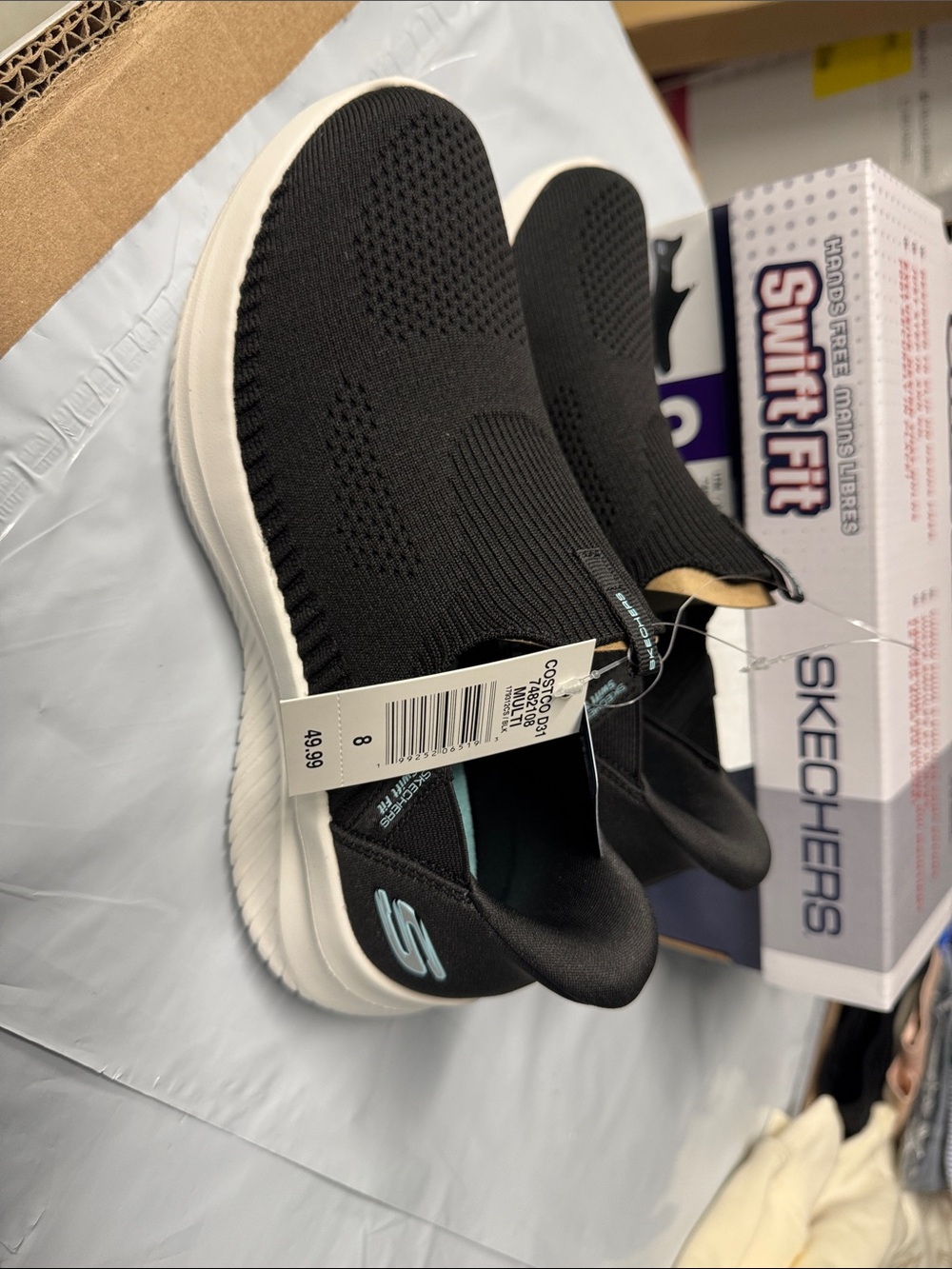 Skechers womens Black Slip-On Knit Sneakers with White Sole